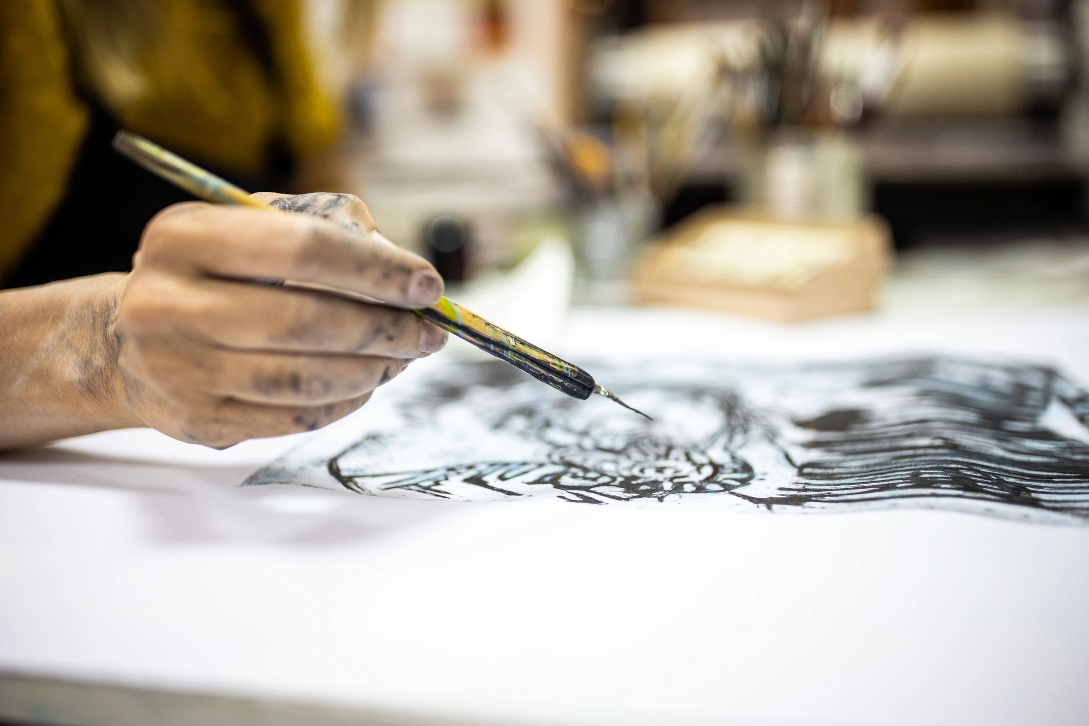 artist painting studio process